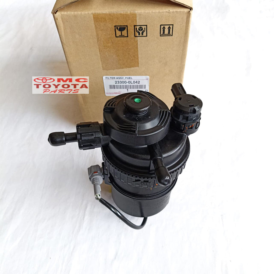 Rumah Filter Solar Assy Kijang Innova Fortuner Hilux Diesel 2KD Original Toyota 23300-0L042 Rumah Fuel Filter Solar Komplit Pompa Solar Assy Ori